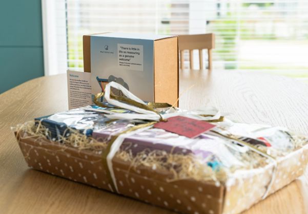 Internal of a luxury lodge dining table with welcome gifts
