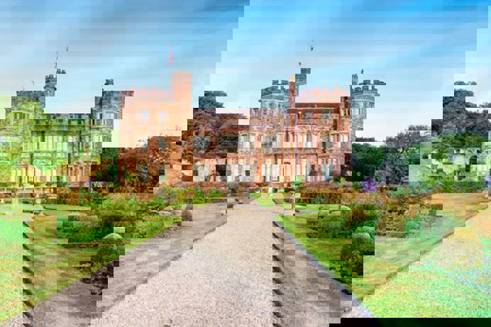 A grand stately home among countryside