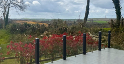 External of a lodge on pitch with surrounding countryside views