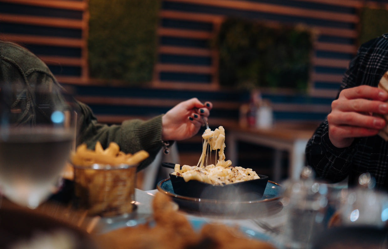 A cheese pull of Mac 'n' Cheese from Southside Bar & Grill 