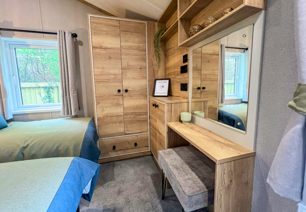 Internal of a caravan twin bedroom dressing area