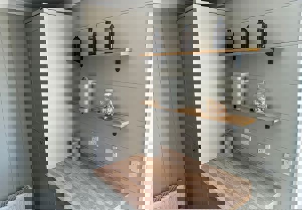 Utility area with storage