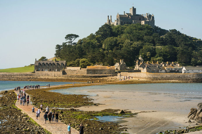 A striking castle atop a hill by the coast