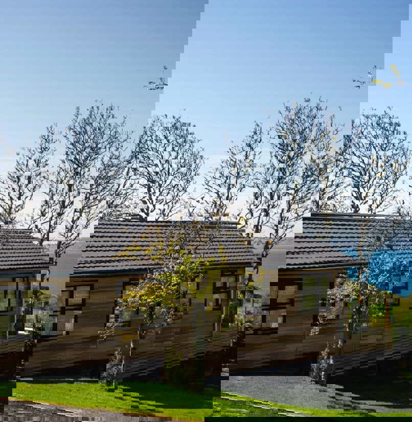 A lodge on pitch at a lodge park with views of the sea