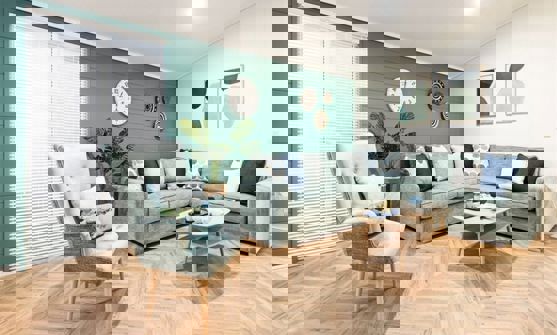 Interior of a Lodge Open Plan Living Space with L-shaped sofa and armchair