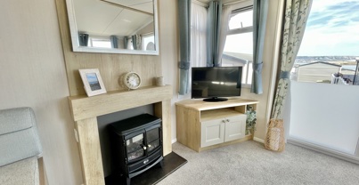 Internal of a caravan lounge with fireplace