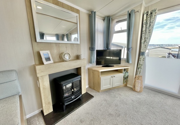 Internal of a caravan lounge with fireplace