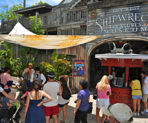 A shipwreck treasure museum with visitors standing outside