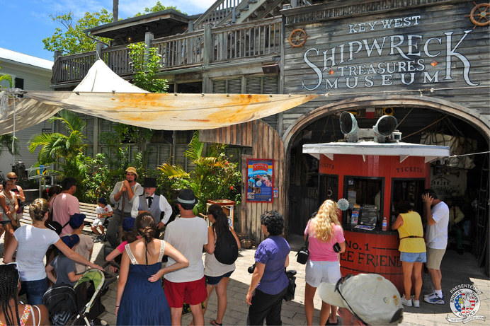 A shipwreck treasure museum with visitors standing outside