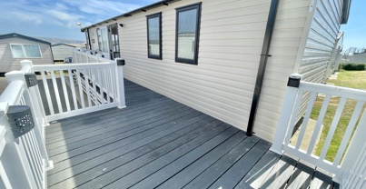 External of a caravan on pitch with decking