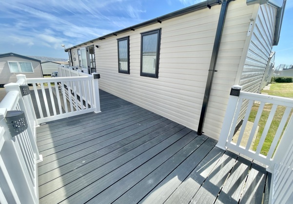 External of a caravan on pitch with decking