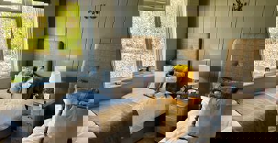 Modern country theme twin bedroom with sage walls and checked bedding