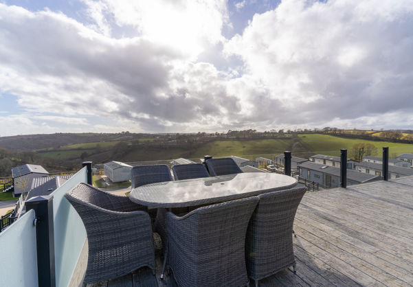 Outdoor seating area on holiday lodge decking