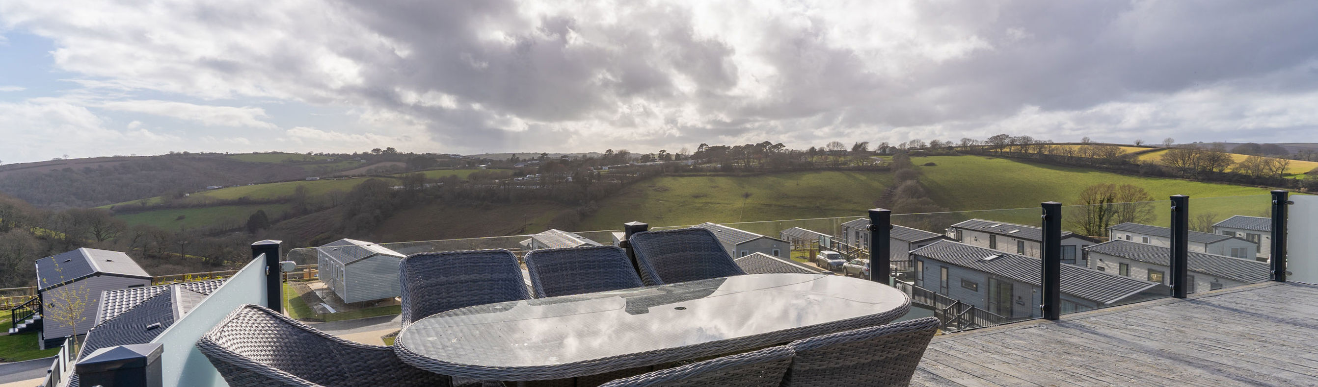 Outdoor seating area on holiday lodge decking