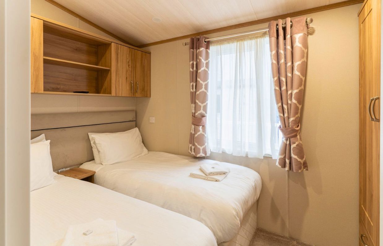 Internal of a caravan twin bedroom