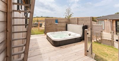 External of a luxury lodge with hot tub