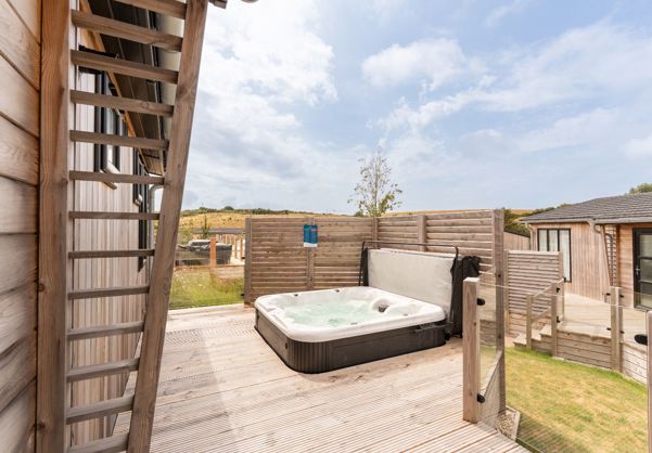 External of a luxury lodge with hot tub