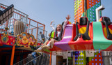 Children on a drop tower ride at Southside Funfair
