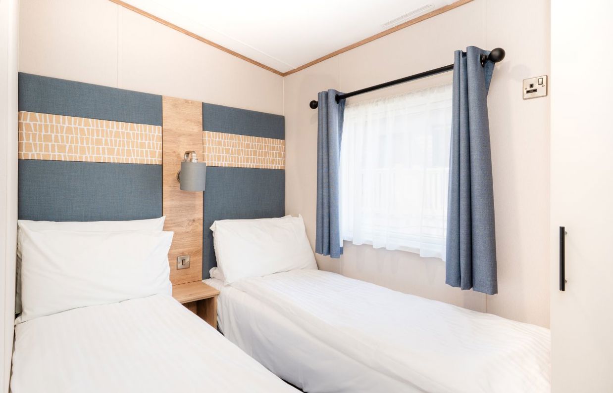 Internal of a caravan twin bedroom