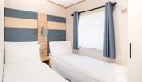 Internal of a caravan twin bedroom