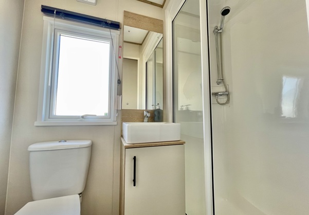 Internal of a caravan bathroom with shower toilet and sink