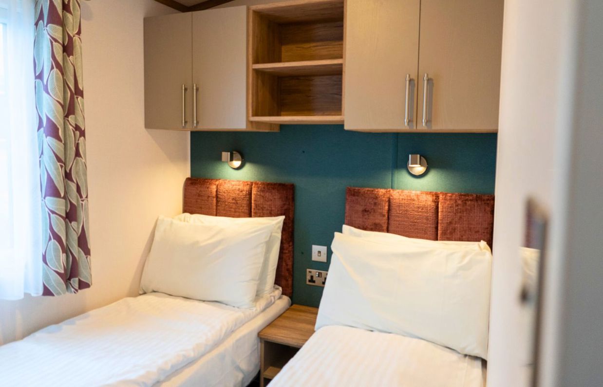 Internal of a caravan twin bedroom