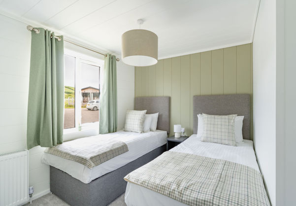 Internal of a luxury lodge twin bedroom