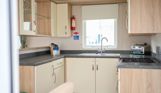 Internal of a caravan open plan kitchen