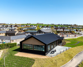 An aerial view of The Barn on Tregoad Holiday Park 