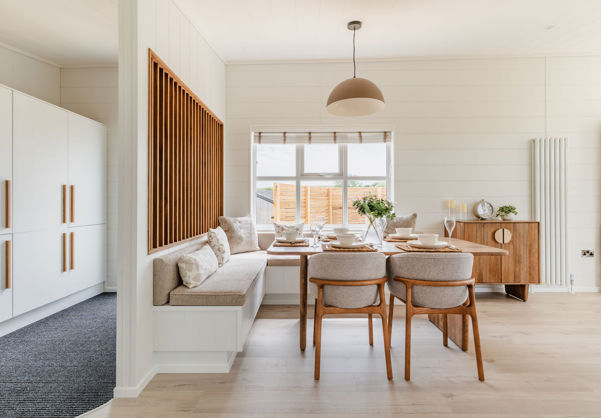 Internal of a luxury lodge open plan dining area with bench seating