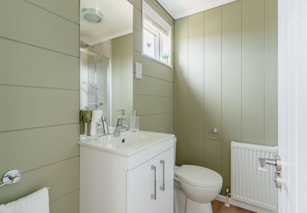 Internal of a luxury lodge ensuite bathroom with toilet and sink