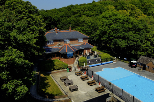 Aerial view of the country club and heated outdoor pool