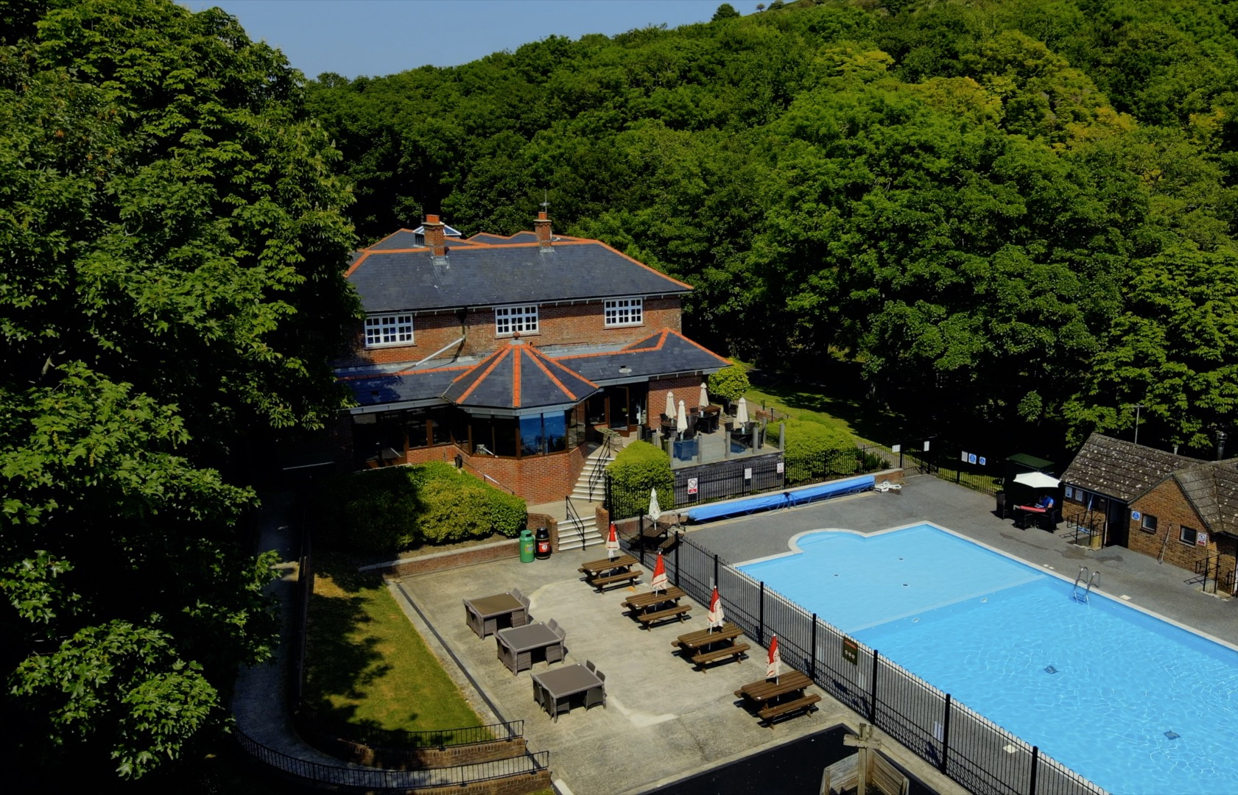 Aerial view of the country club and heated outdoor pool