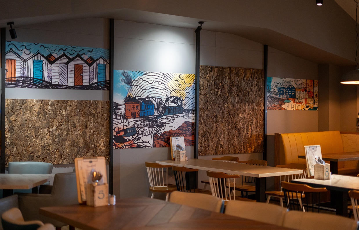 The internal of Breeze Bar & Grill with tables and chairs 