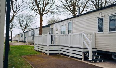 External of a caravan on pitch with decking