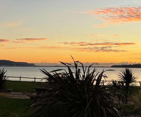 View of Bowleaze Cove at sunset