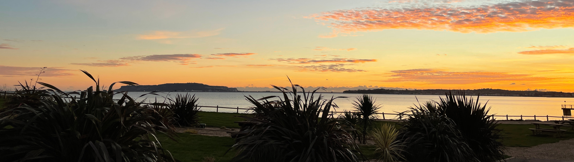 View of Bowleaze Cove at sunset