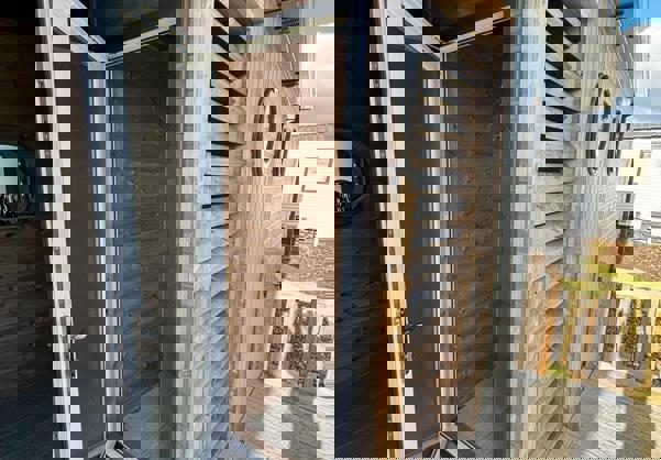 private outside storage space for larger items such as surfboards and wet-suits.