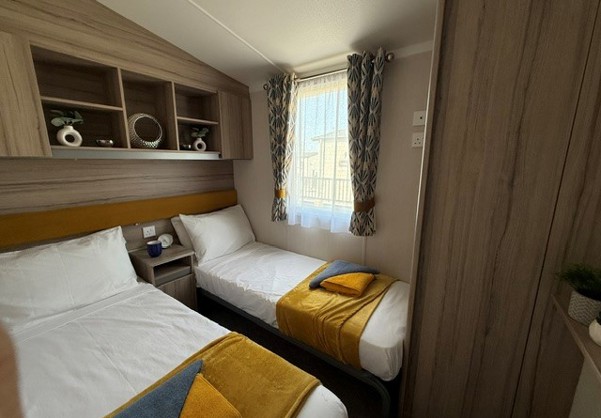 Internal of a caravan twin bedroom
