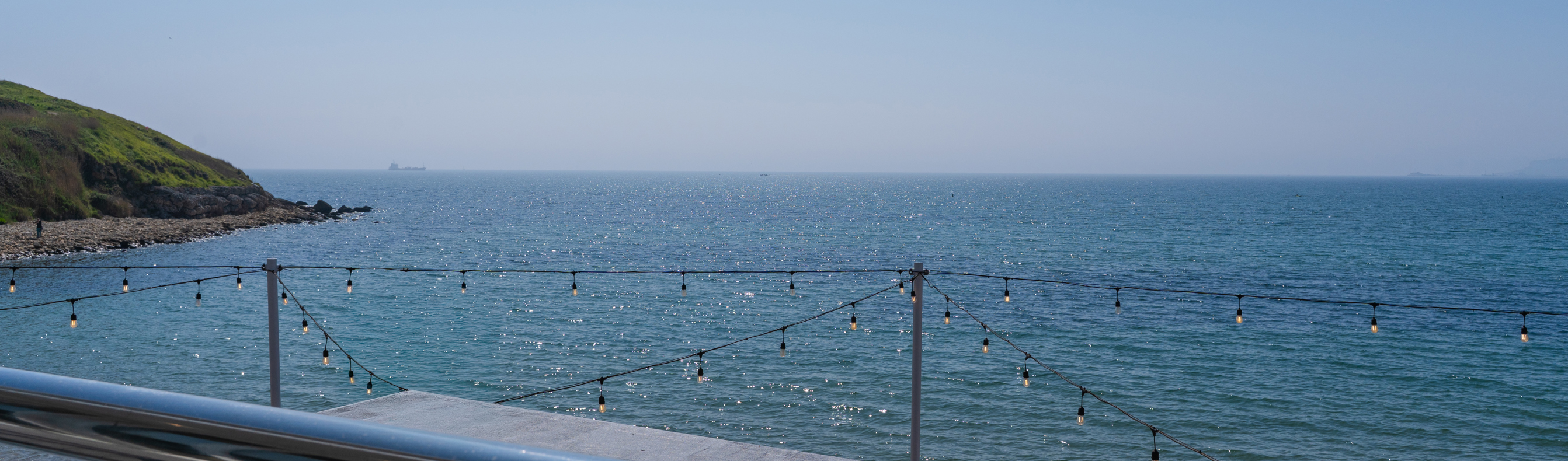 Views of the sea and coast from Drift Bar & Grill