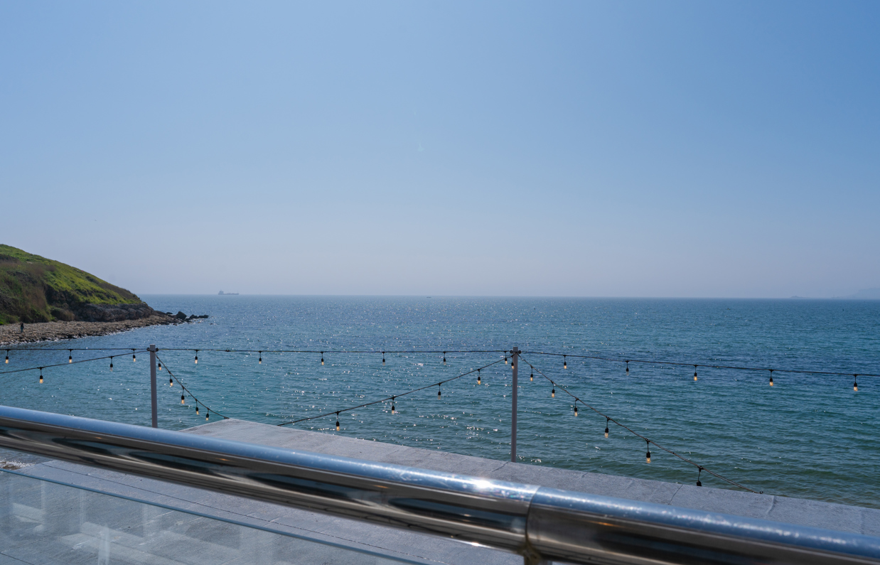 Views of the sea and coast from Drift Bar & Grill