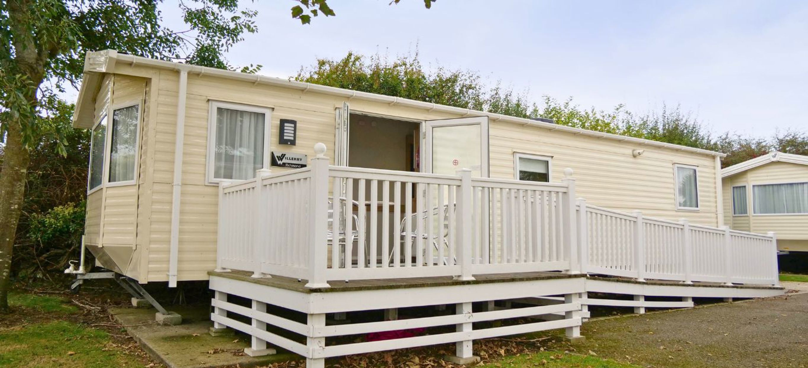 External of an accessible caravan ramp to entrance with decking