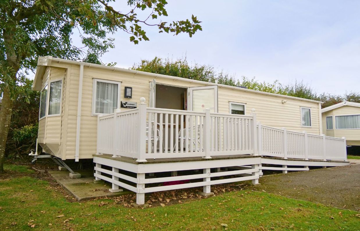 External of an accessible caravan ramp to entrance with decking