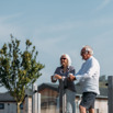 Elder couple relaxing on deck 
