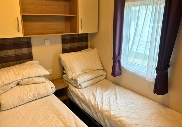 Internal of a caravan twin bedroom