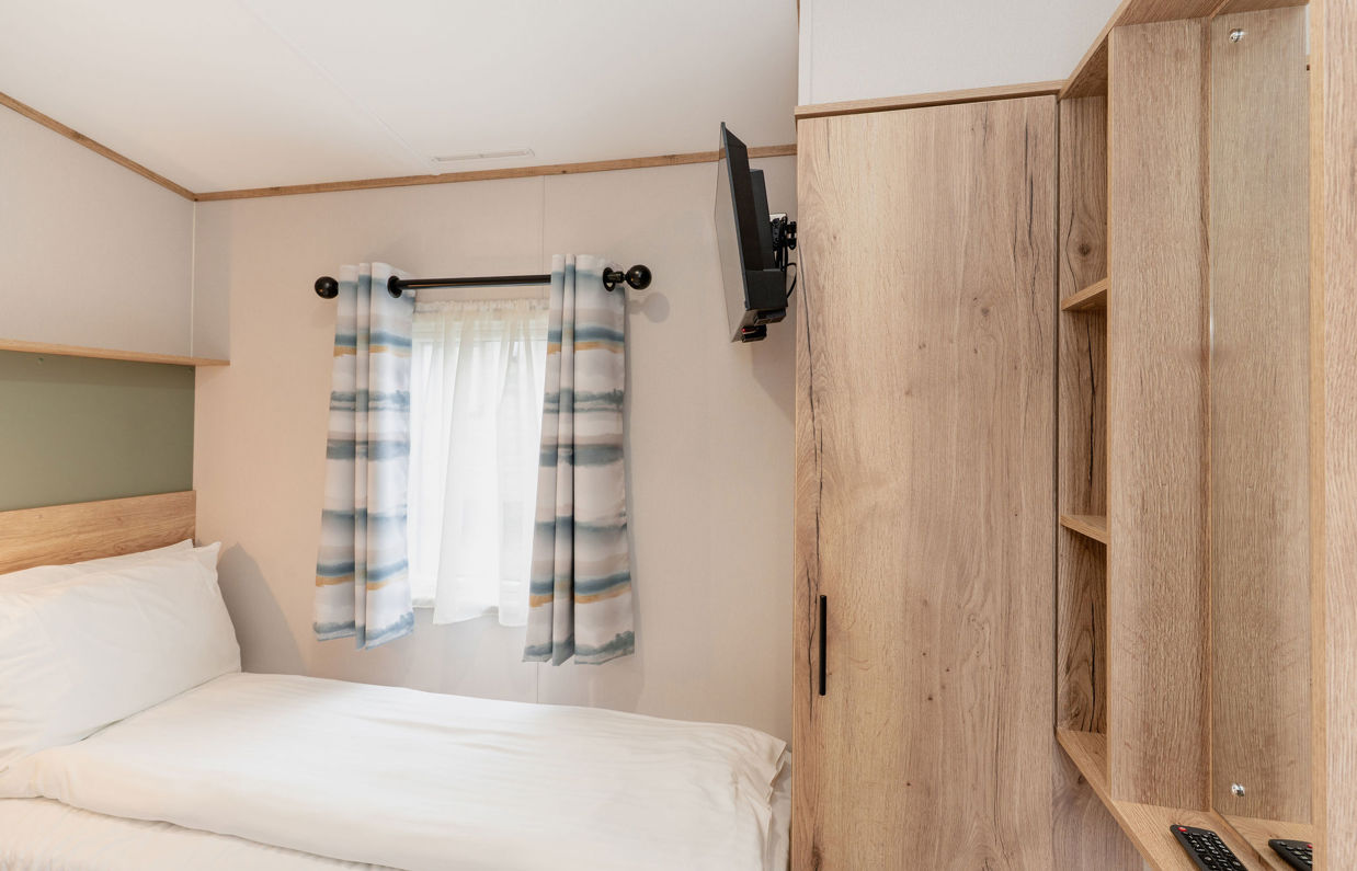 Internal of a caravan twin bedroom