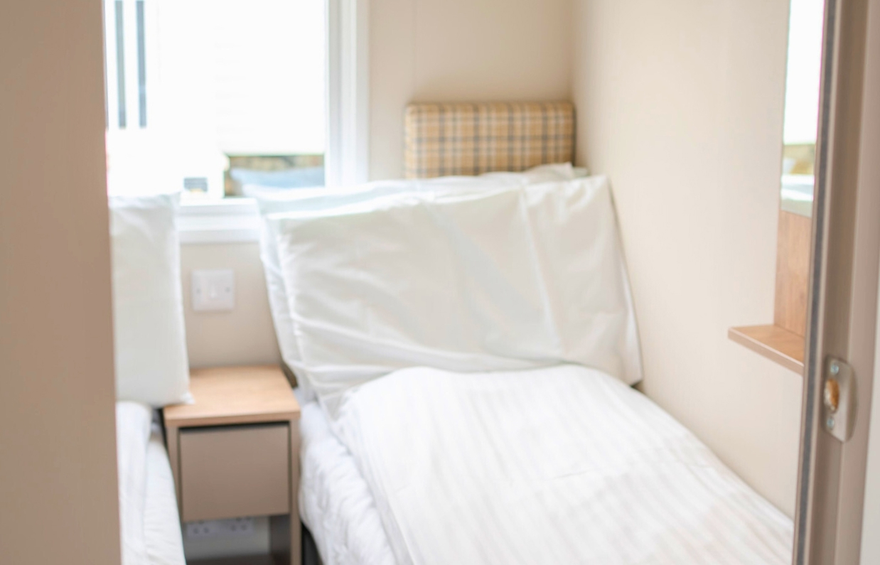 Internal of a caravan twin bedroom