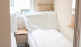 Internal of a caravan twin bedroom