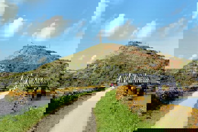 A walking trail around a countryside area with a body of water