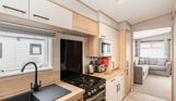 Internal of an accessible caravan open plan kitchen